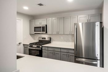 Stone countertops kitchens and baths* - Hampshire Green Apartments